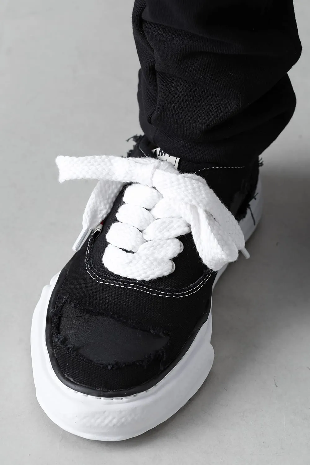 -BAKER- Original sole broken canvas Low-Top sneakers Black