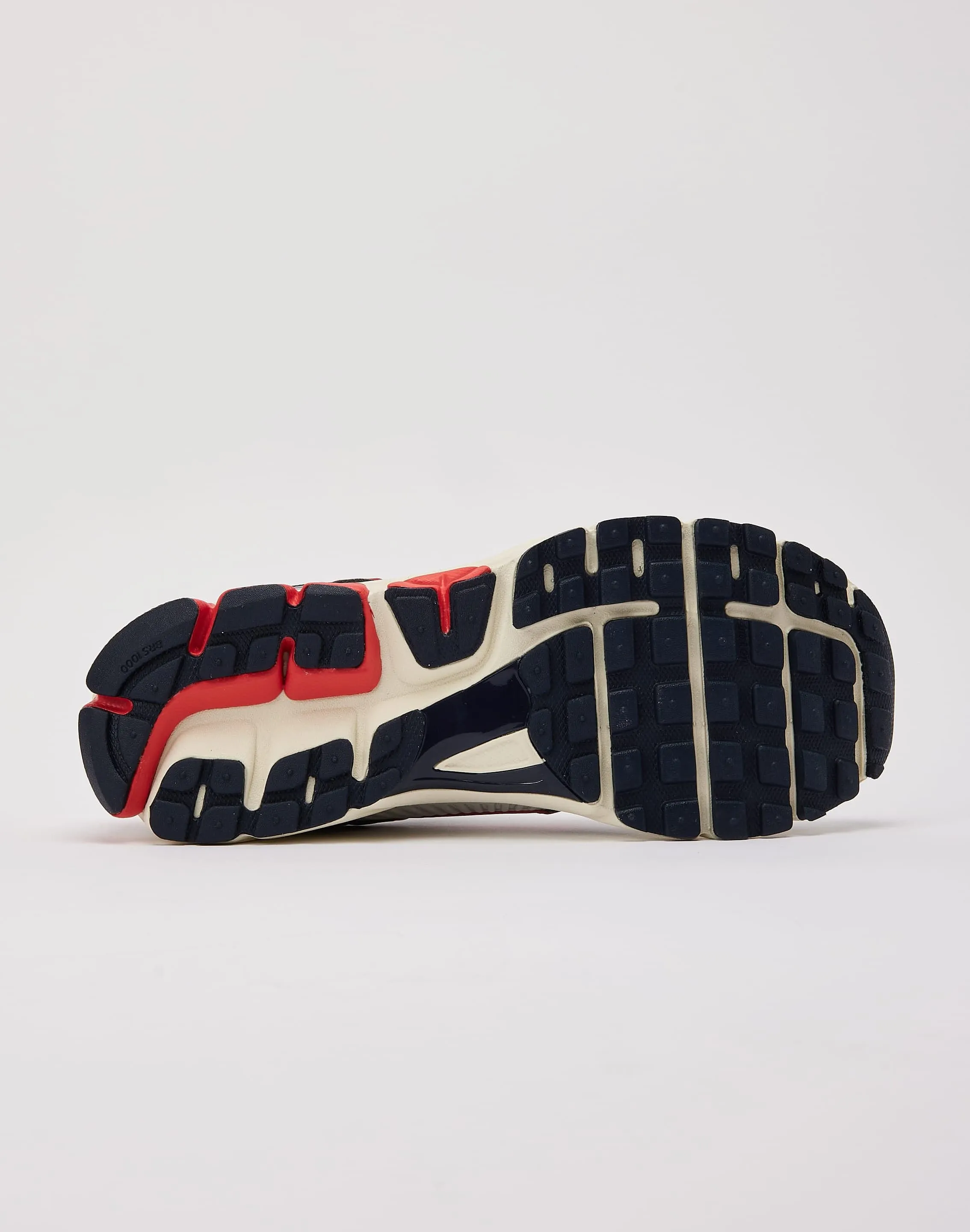 Comfort Flex Nike Zoom Vomero 5 running with a backpack city running shoe area