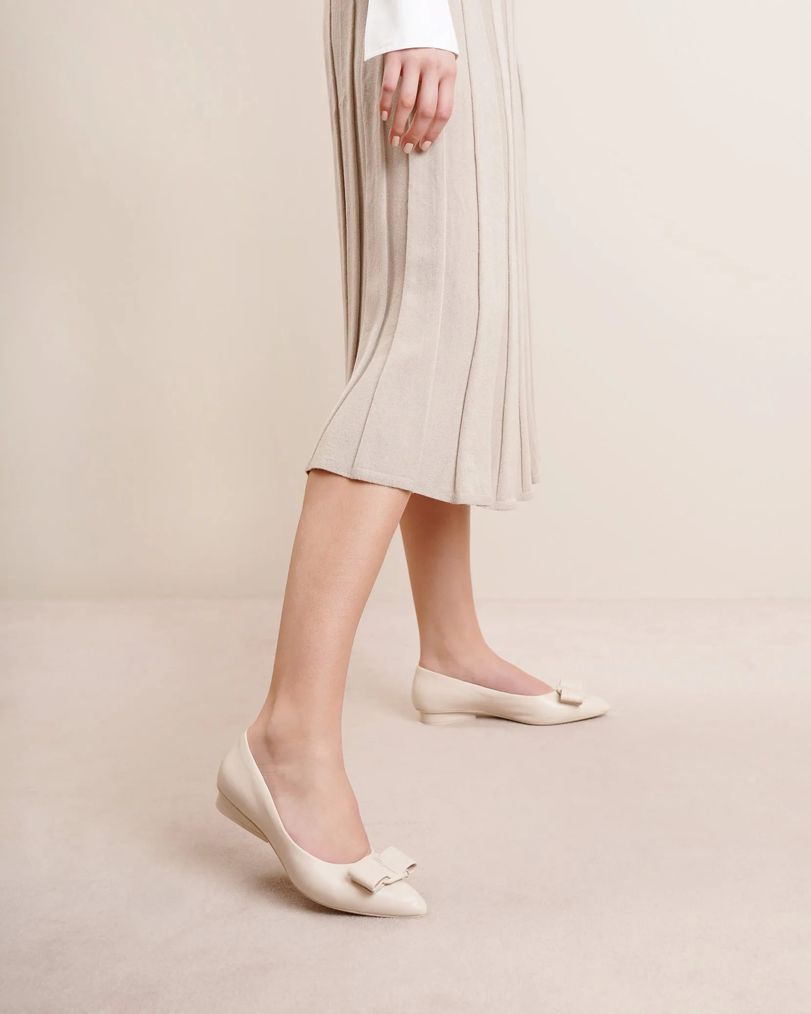 Viva bone flat pumps